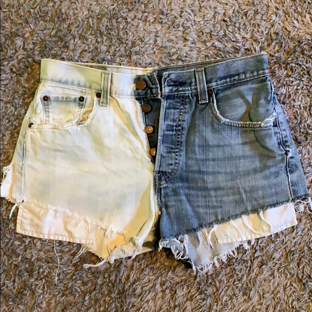 Levi’s Distressed two tone denim jean shorts
